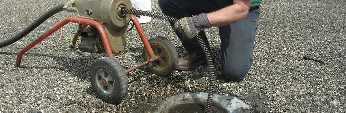 sewer rodding technician actively removing blockages from a sewer line in Las Vegas, NV